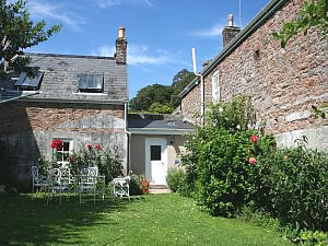 The enclosed garden at Bakehouse Cottage